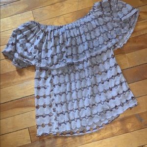 Gimmicks off the shoulder top